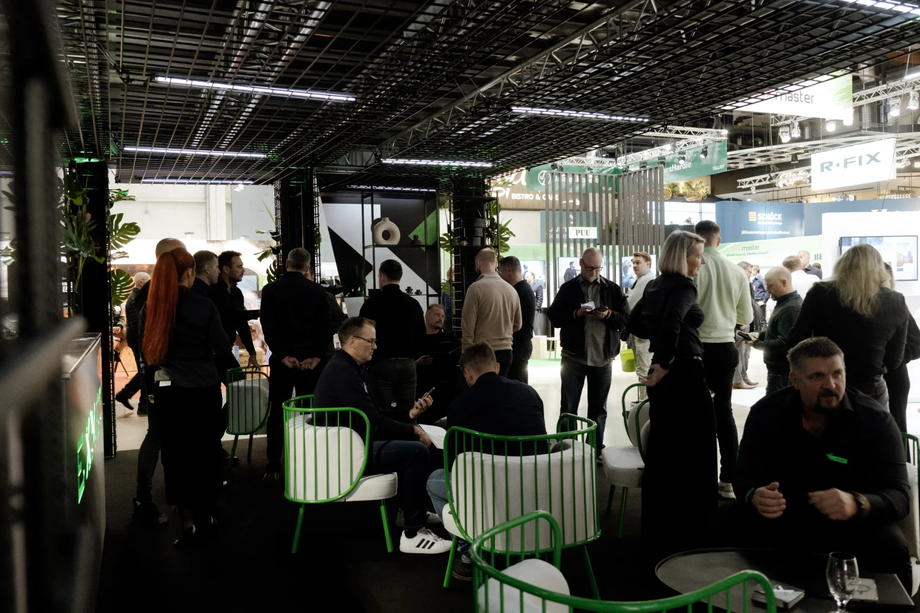 Visitors gathered inside the Exmet stand