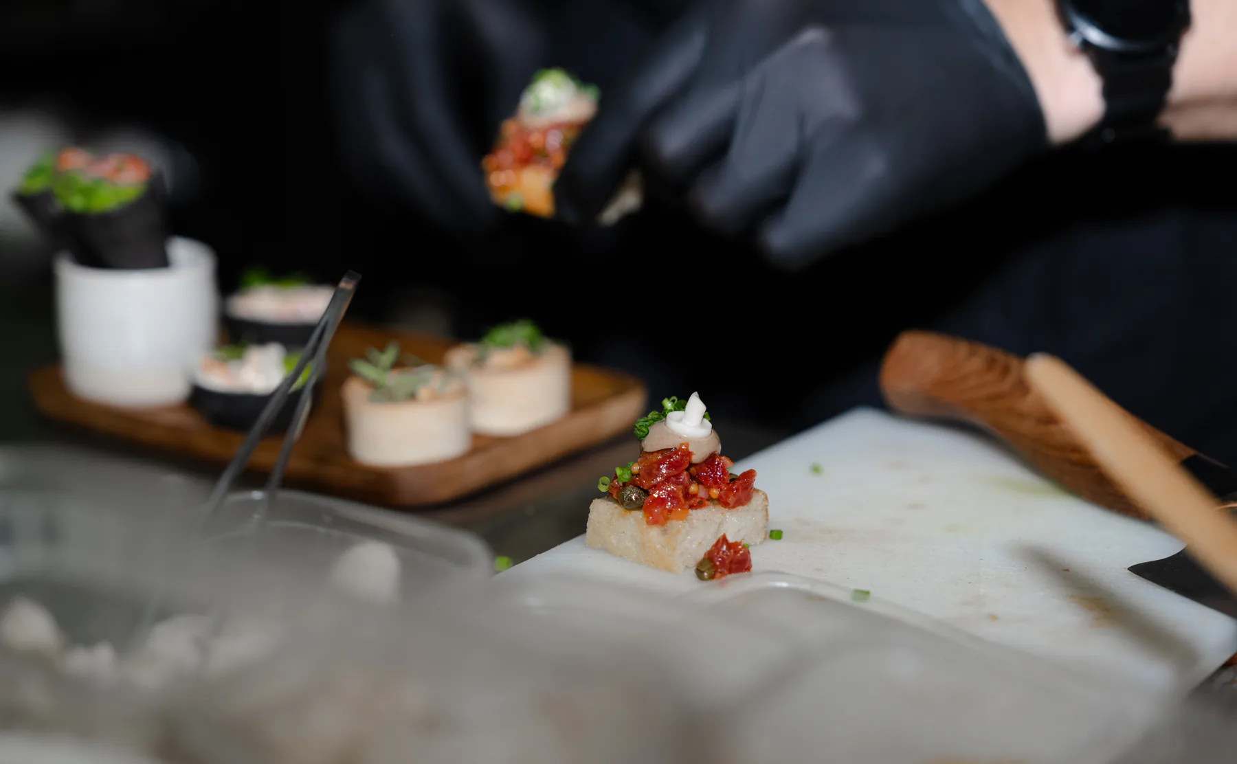 Close-up of small plates being served at the Exmet stand